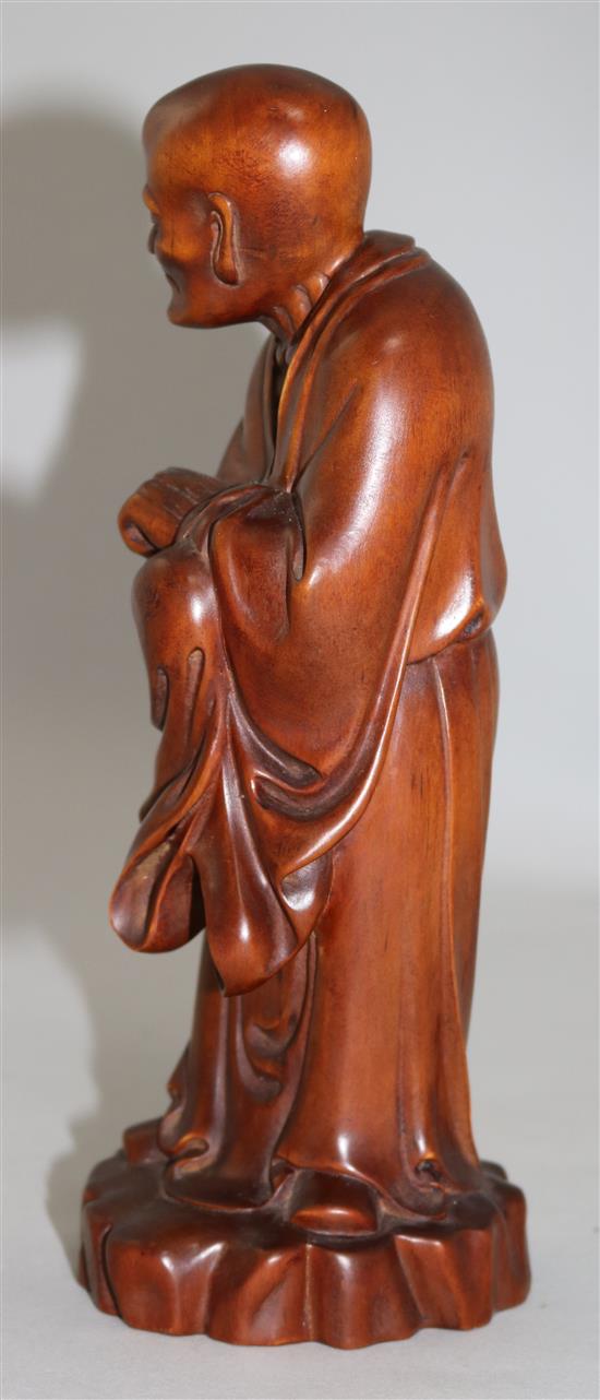 A Chinese boxwood standing figure of Luohan, 23.5cm
